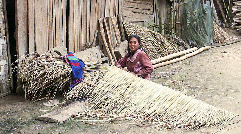 Lao Loum Frau bei der Arbeit